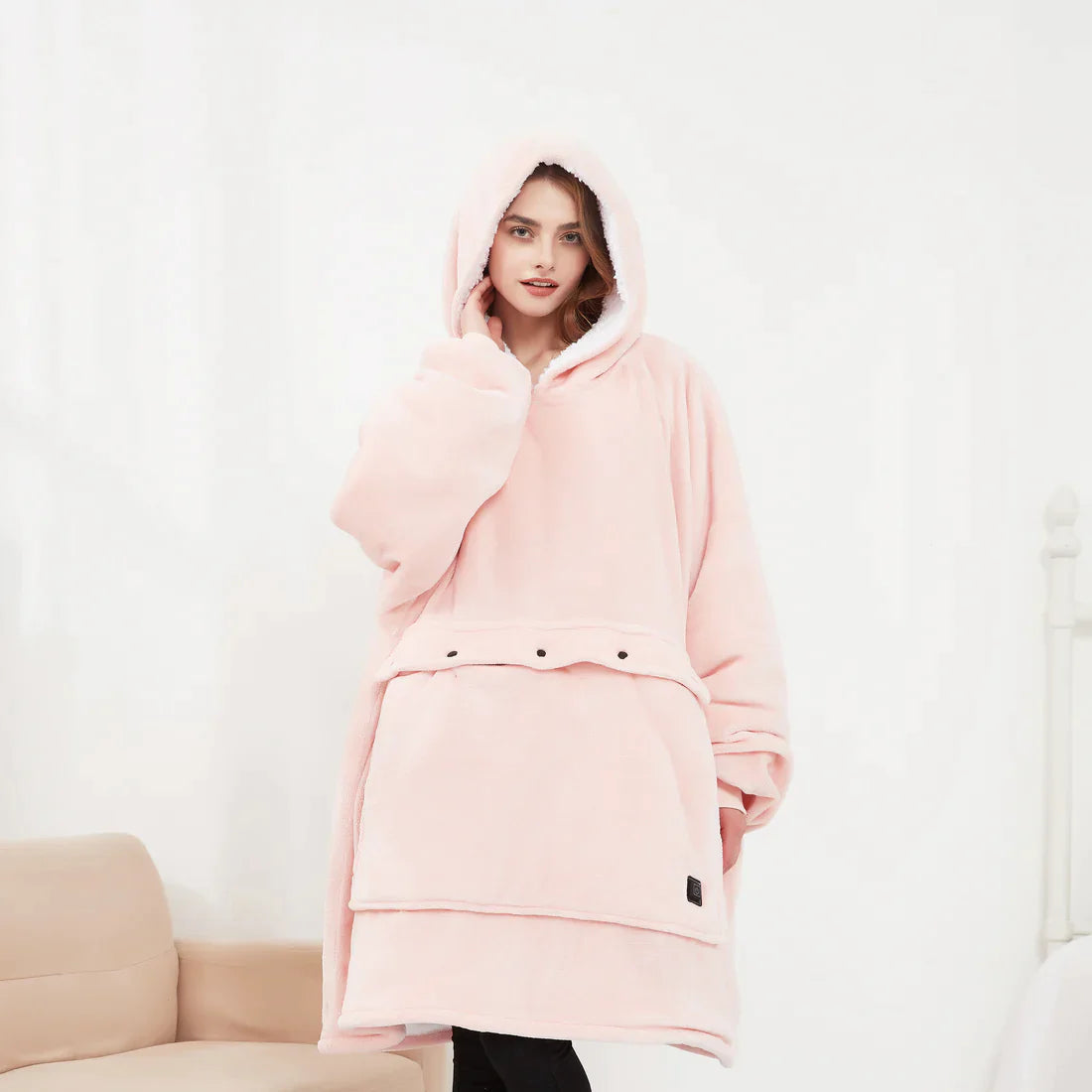 Couverture-sweat à capuche chauffante